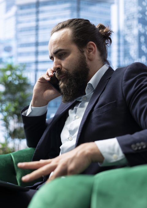 General director finalizing an agreement with investors group over phone call, balancing corporate responsibilities and strategic planning. Ensuring sustainable growth and business success.